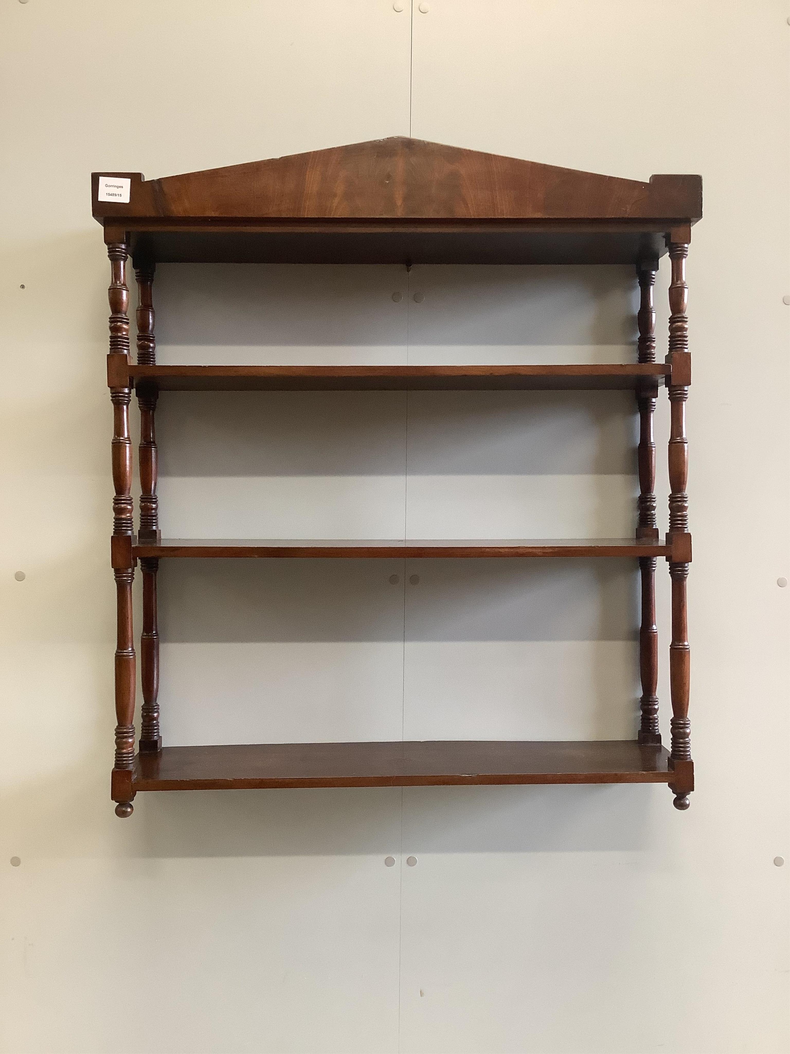 A Regency mahogany three tier wall bracket, width 81cm, depth 19cm, height 91cm. Condition - fair